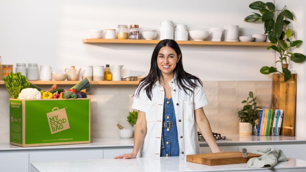 Nadia Lim with a My Food Bag meal kit in a kitchen