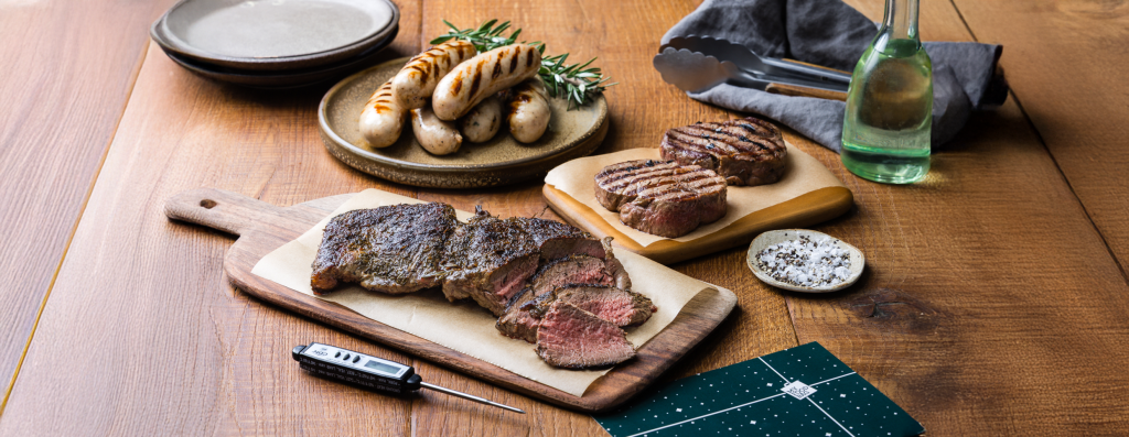 Lamb leg butterflied with herbs, beef eye fillet and traditional pork sausages.